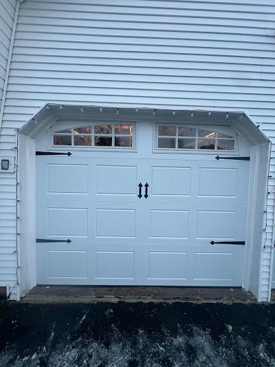 Garage Door Panel Replacement Burlington MA- Magic Garage Door Repair